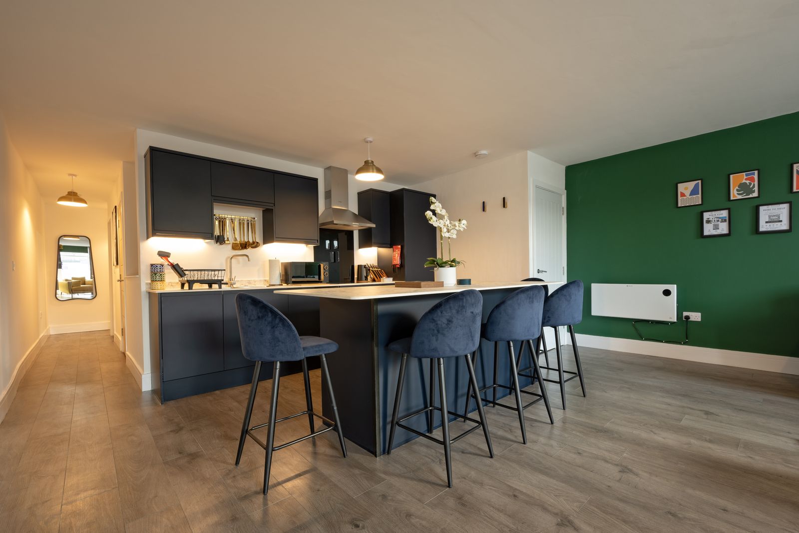 Kitchen-diner with breakfast bar and bar stools